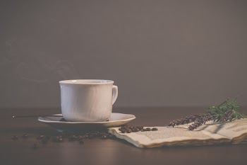 White Ceramic Teacup With Saucer