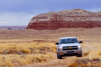 White Chevrolet Vehicle on Dessert