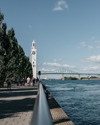 White Clock Tower and Gray Bridge
