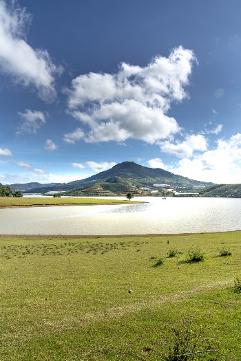 White Clouds over Mountain and Lake