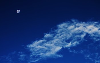 White Clouds Under Blue Sky With Gibbous Moon