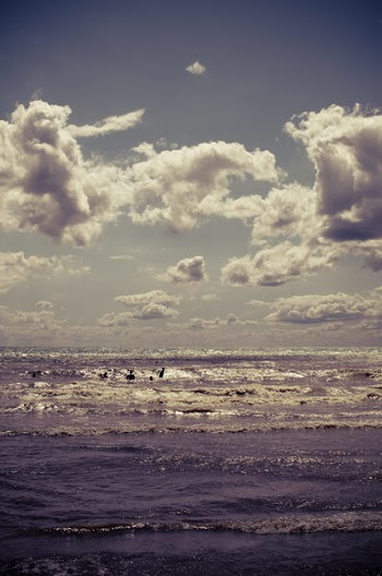 White Clouds Under Body of Water