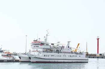 White Commuter Boat on Body of Water