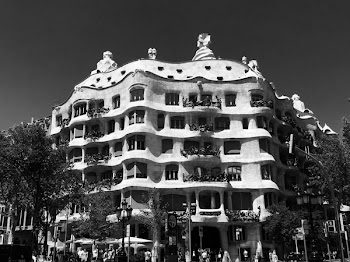 White Concrete Building in Grayscale Photography