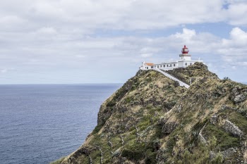White Concrete Building on Cliff