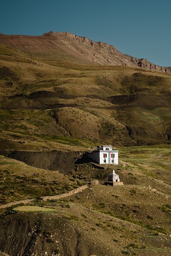White Concrete Building on Gray Mountain