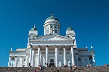 White Concrete Building Under Blue Sky