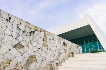 White Concrete Building Under Blue Sky