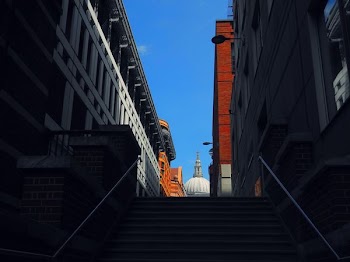 White Concrete Building Under Blue Sky