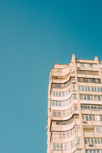 White Concrete Building Under Blue Sky · Free Stock Photo