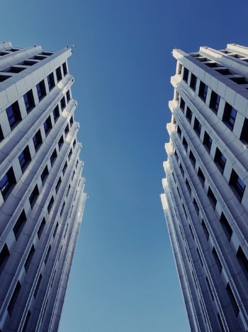 White Concrete Building Under Blue Sky · Free Stock Photo