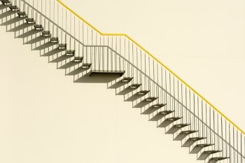 White Concrete Staircase With White Wall · Free Stock Photo