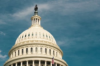 white concrete structure with American flag