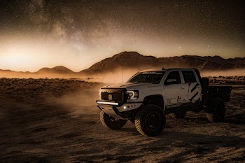 White Crew Cab Pickup Truck on Desert