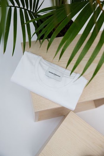 white crew-neck top on tabletop
