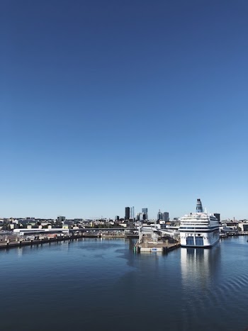 White Cruise Ship Under Sunny Sky
