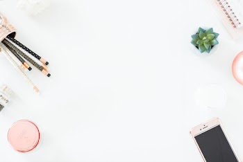 White desktop with copper details