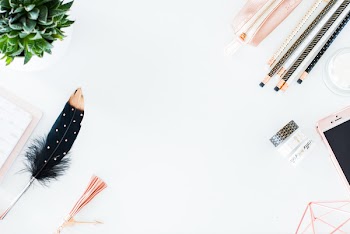 White desktop with copper details