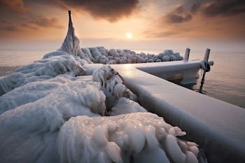 white dock covered with snow