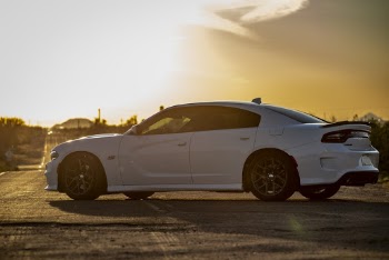 White Dodge Charger Parked On Road
