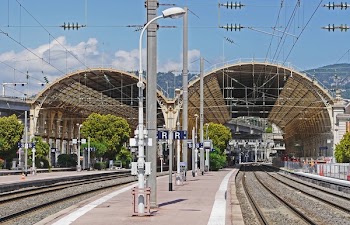 White Electric Post Near Railway