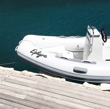 White Ephyra Center Console Boat on Body of Water