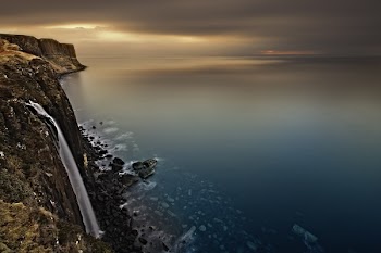 White Fabric Hanging on a Cliff