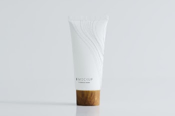 White face cream tube mockup Free Psd
