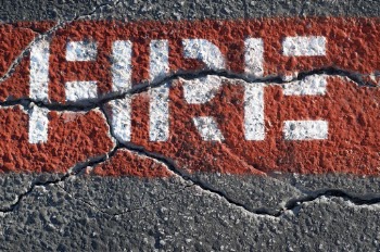 White Fire Text On Wall