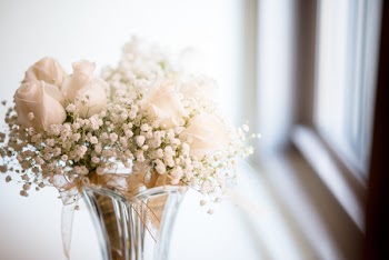 White Flowers in a Transparent Vase