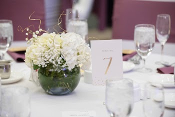 White Flowers In Vase On Table