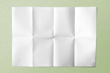 White folded paper on green | Free Photo - rawpixel