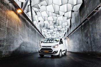 white Ford car