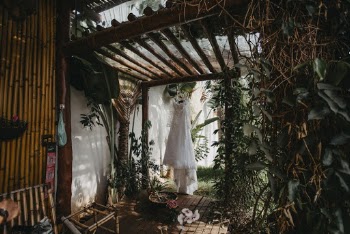 White Gown HangingNear Garden