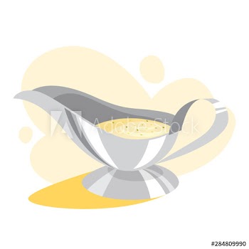 White gravy boat full of sauce