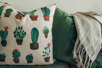 White, Green, and Brown Throw Pillow