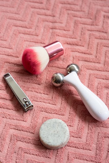 White Handheld Massage Tool And Stainless Steel Nail Cutter