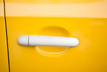White Handled Yellow Car Door