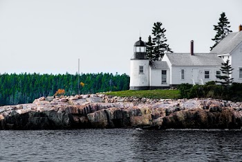 White House Beside Body of Water