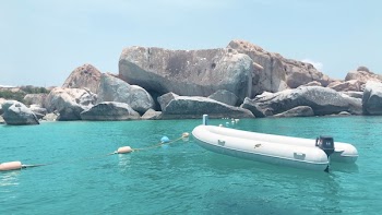 White Inflatable Boat on Body of Water