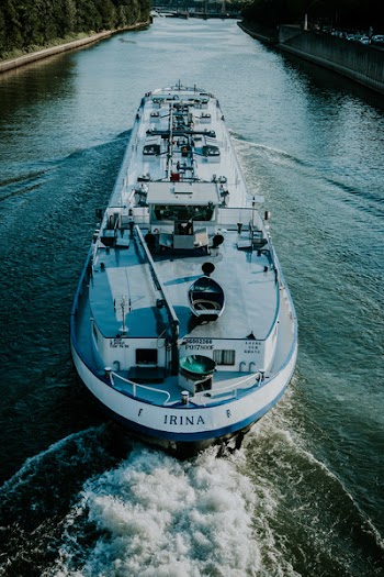White Irina Boat on Body of Water