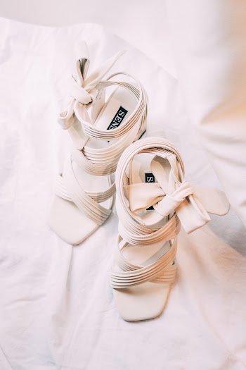 White Leather Sandals on White Textile