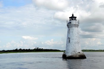 White Light House in the Middle of Sea