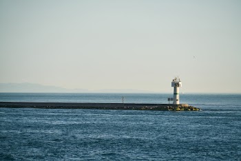 White Lighthouse Beside Ocean