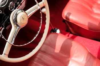 white Mercedes-Benz steering wheel
