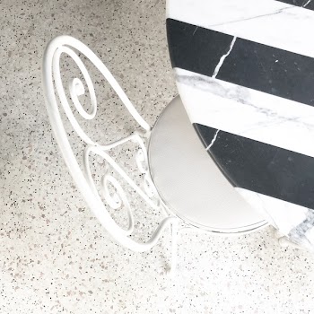 White Metal Framed Chair