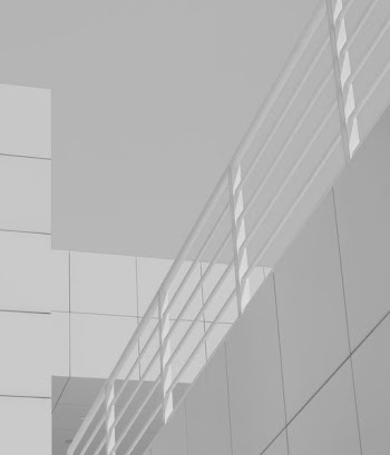 white metal railing at daytime