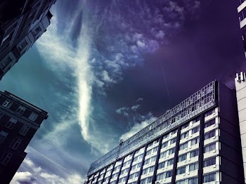 White Mid-rise Building Under Sky