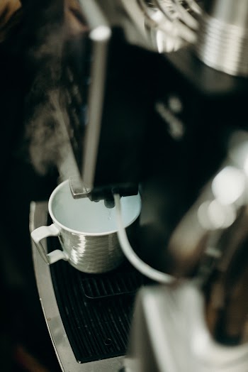 White Mug on Coffee Maker