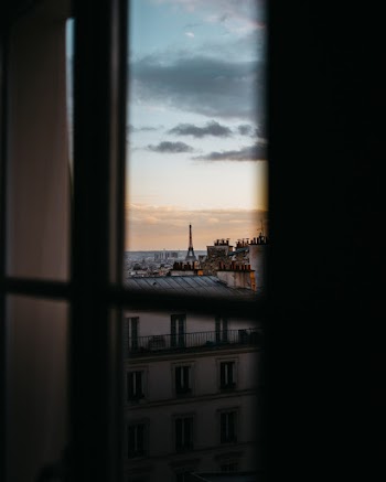 White Painted House Seen Through A Window